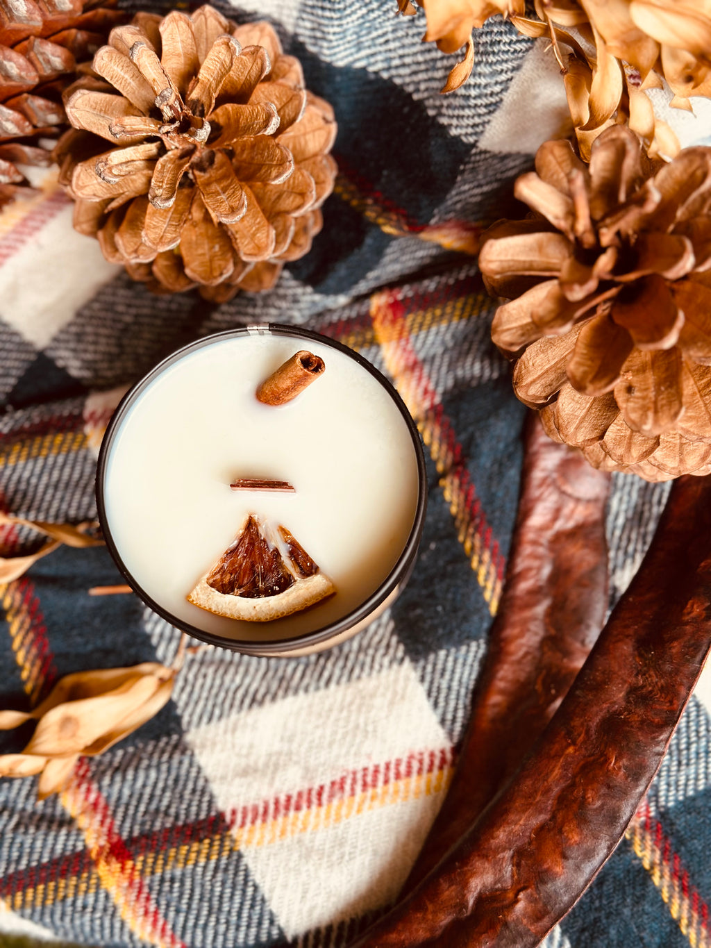 Vela Canela y naranja